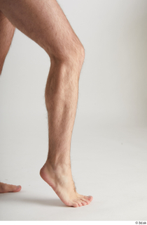 Chadwick  1 calf flexing nude side view 0004.jpg